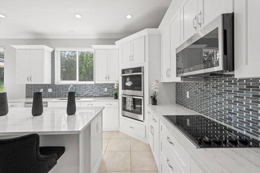 Located in the prestigious Regatta Bay neighborhood of The Isles - photo 17