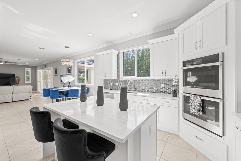 Located in the prestigious Regatta Bay neighborhood of The Isles - photo 18