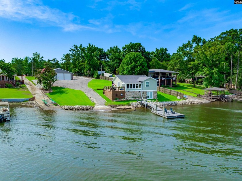 Experience refined waterfront living in this completely - photo 21