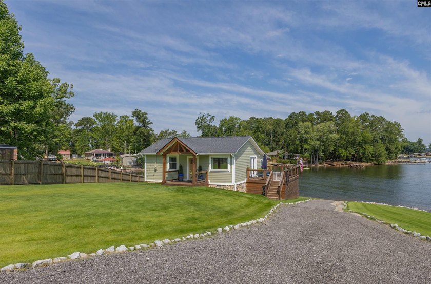 Experience refined waterfront living in this completely - photo 25
