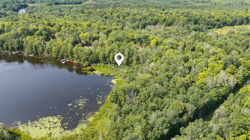 Exceptional opportunity to own 4.4 wooded acres with 326 feet of - photo 14