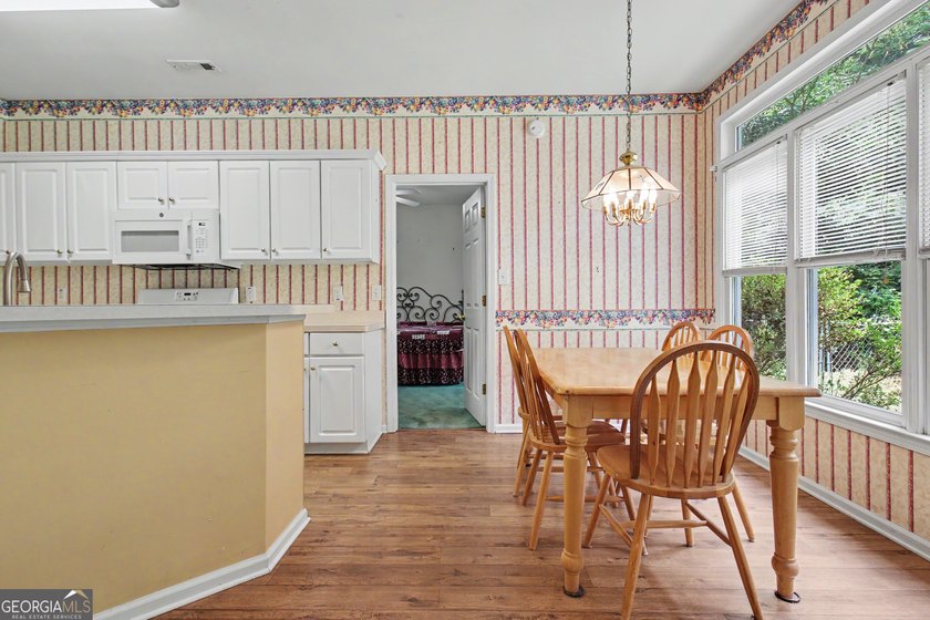 Welcome home to this spacious ranch situated on a private 1+ - photo 31