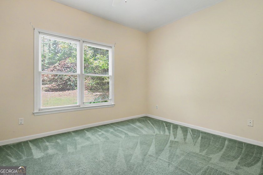 Welcome home to this spacious ranch situated on a private 1+ - photo 47