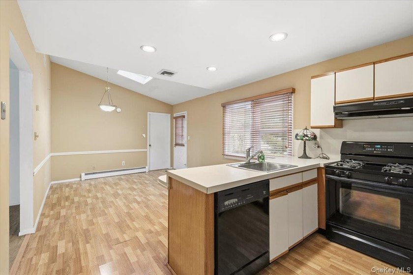 Oversized Cape Cod with All Large Rooms Nestled on Huge Lot on - photo 11