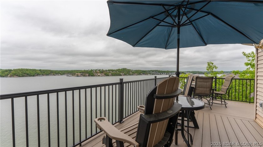 This top-floor 2BR/2BA unit offers privacy, thoughtful upgrades - photo 2