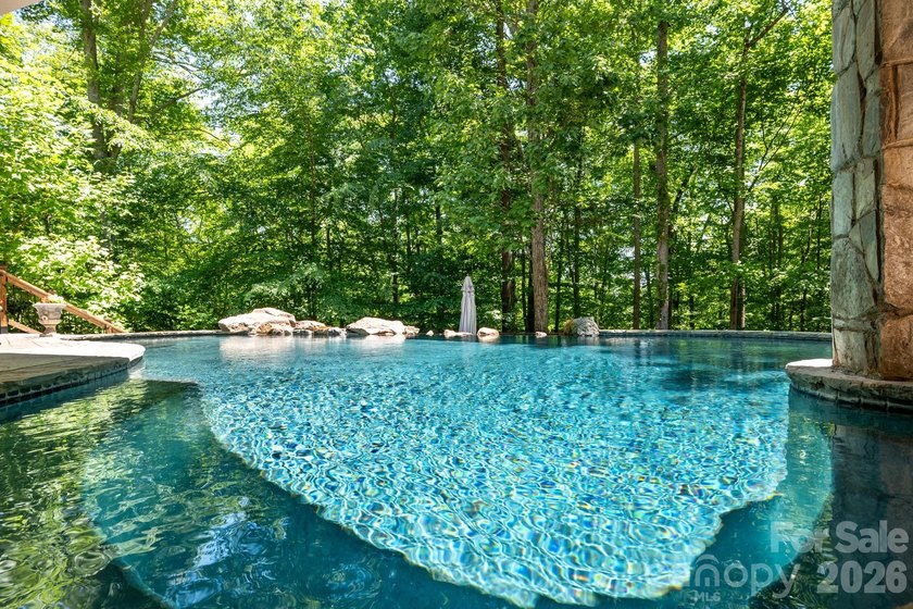 A rare opportunity awaits to own this gated 26-acre estate - photo 3