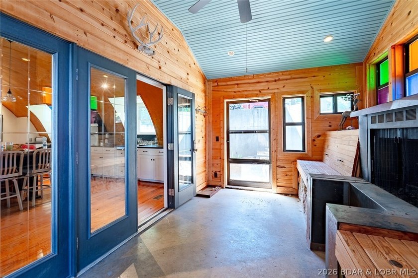 Originally a Quonset hut, this unique lakefront property blends - photo 4