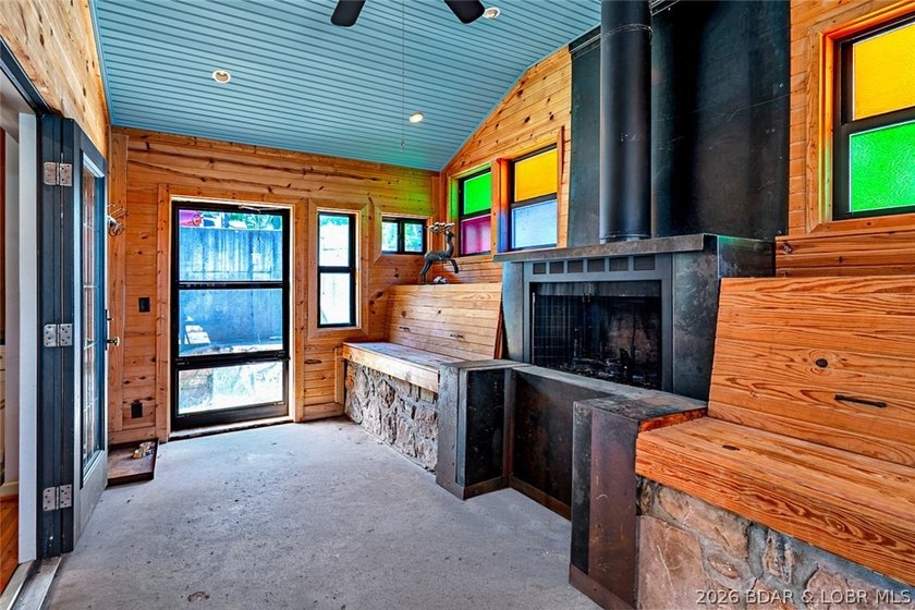 Originally a Quonset hut, this unique lakefront property blends - photo 5