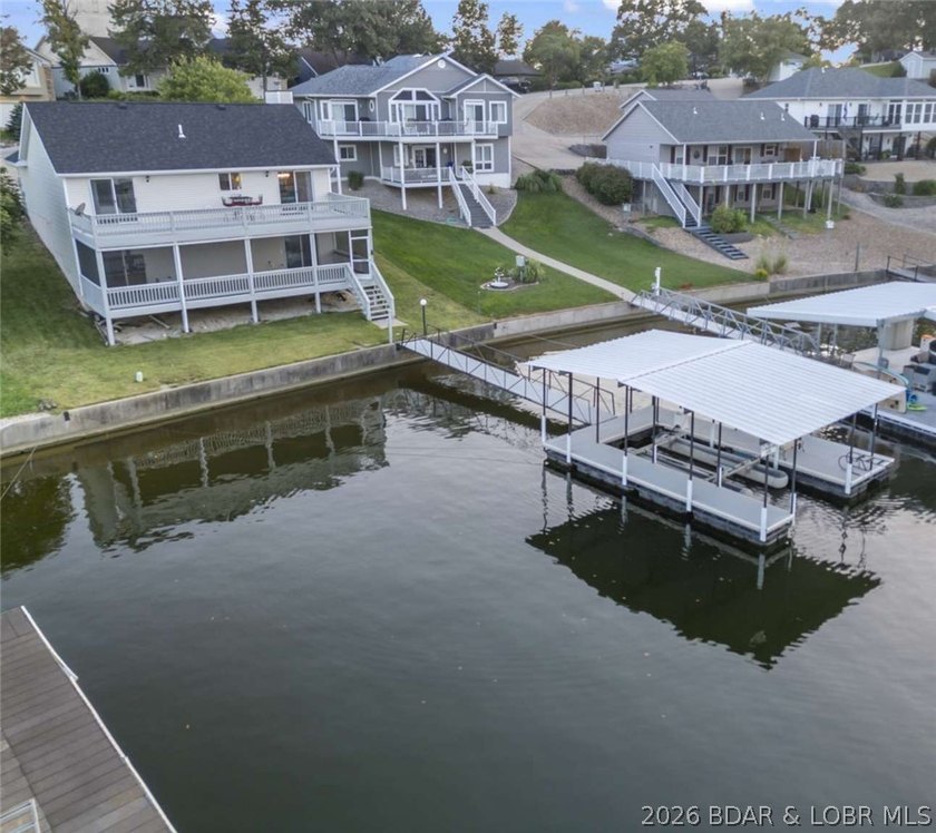 Rare lakefront gem offering a prime location by land and water - photo 2