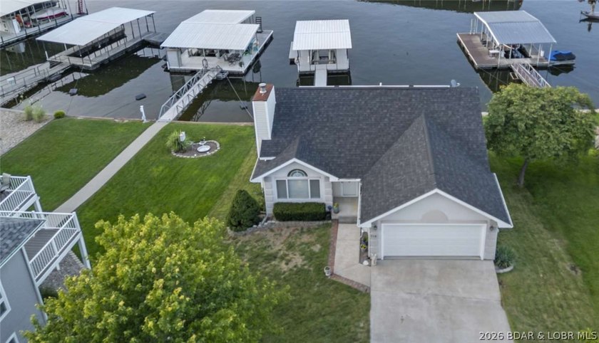 Rare lakefront gem offering a prime location by land and water - photo 4