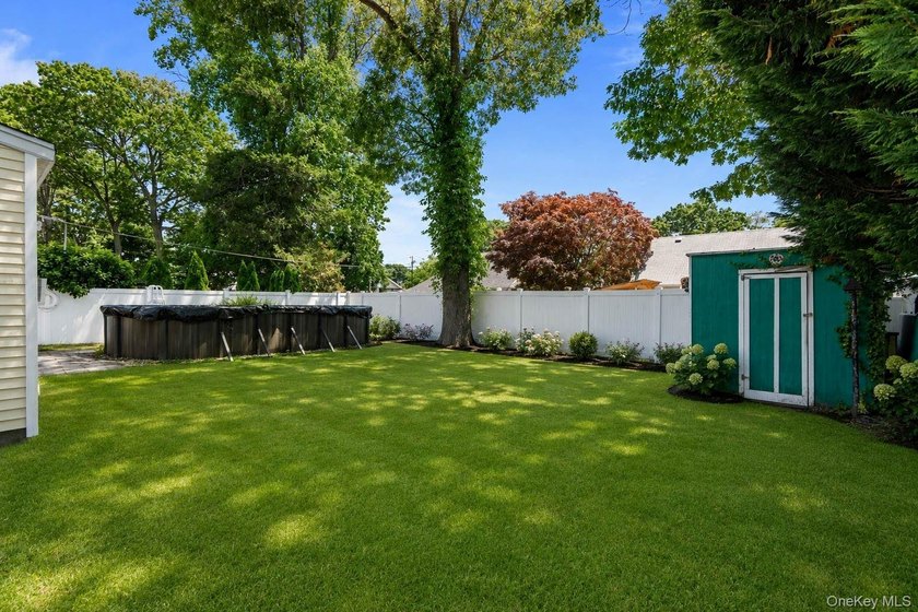 Welcome to 116 Spruce Street in the heart of Massapequa Park - photo 29