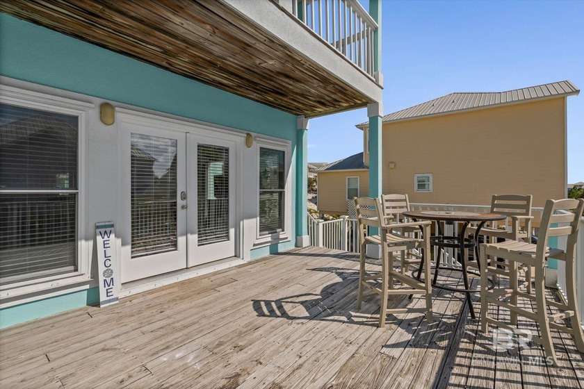 Panoramic Gulf views meet timeless coastal design. Poised within - photo 2