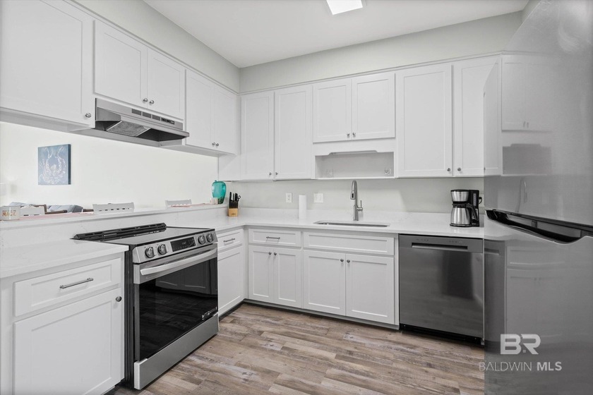 Panoramic Gulf views meet timeless coastal design. Poised within - photo 10
