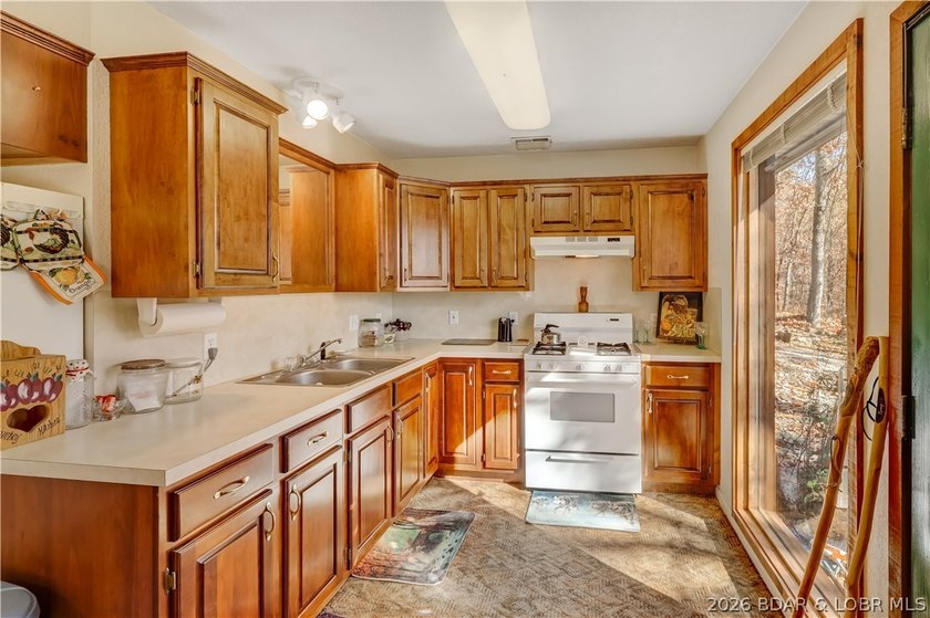 GREAT VALUE! Beautiful home on 4.49+ wooded acres with deeded - photo 9