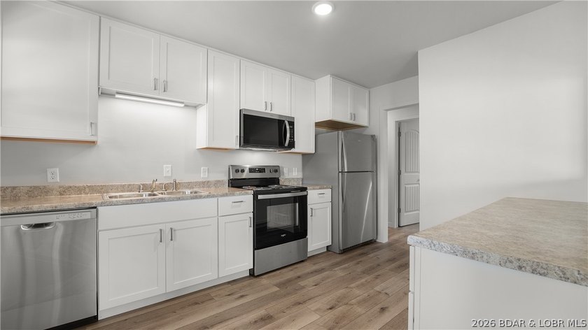 Completely remodeled and move-in ready, this in-town home offers - photo 9