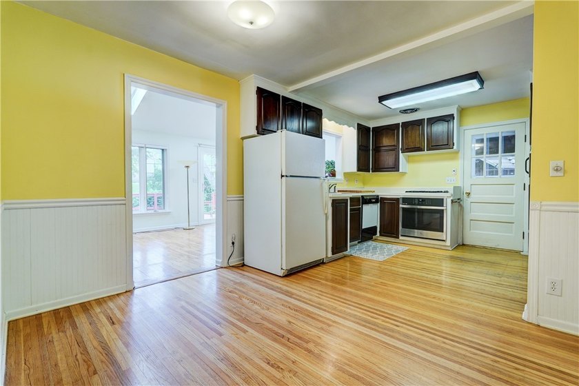 Conveniently located near Lake Ontario, this spacious 3-bedroom - photo 8