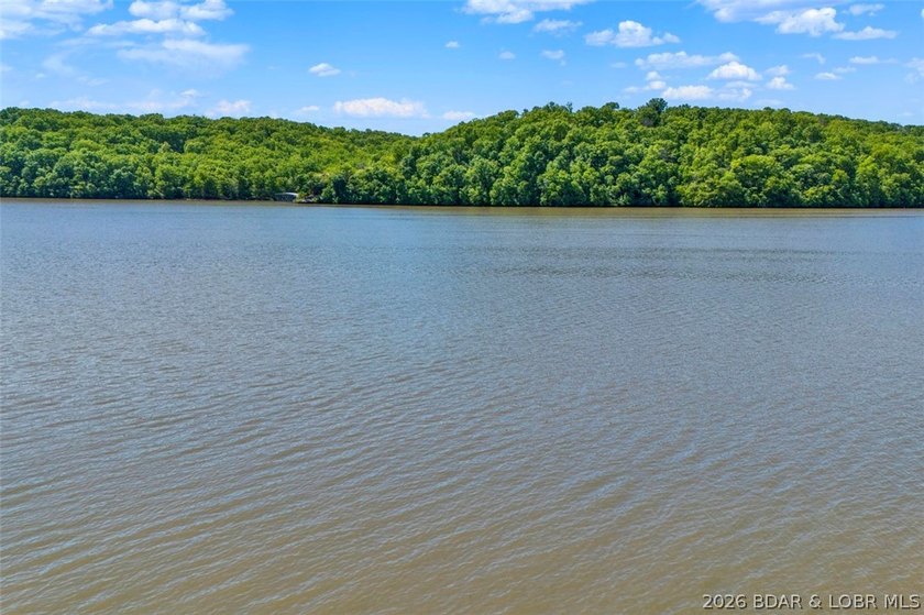 This beautiful parcel of land in Stover, Missouri offers a rare - photo 2