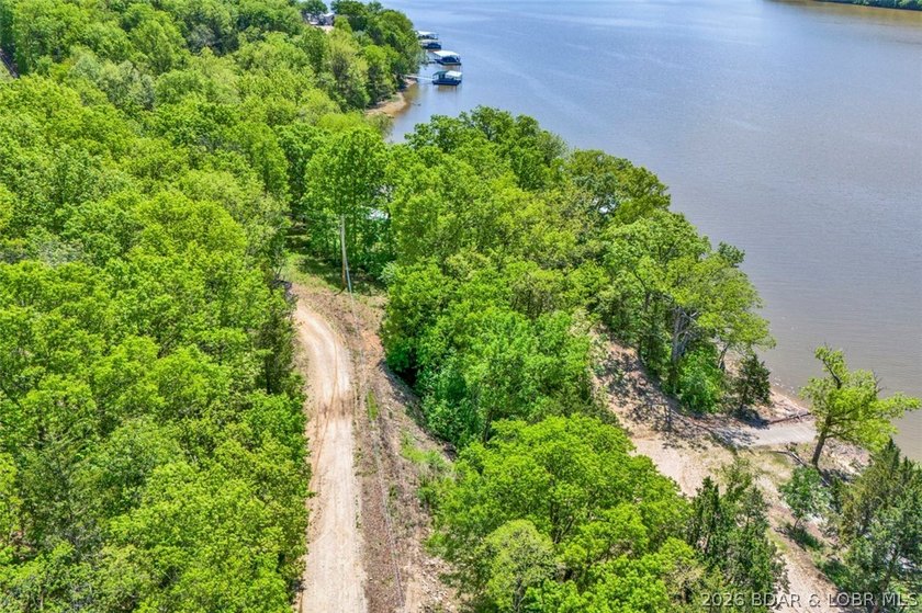 This beautiful parcel of land in Stover, Missouri offers a rare - photo 5