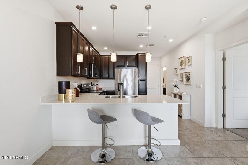 Discover elevated living at The Cays in Downtown Ocotillo! This - photo 12