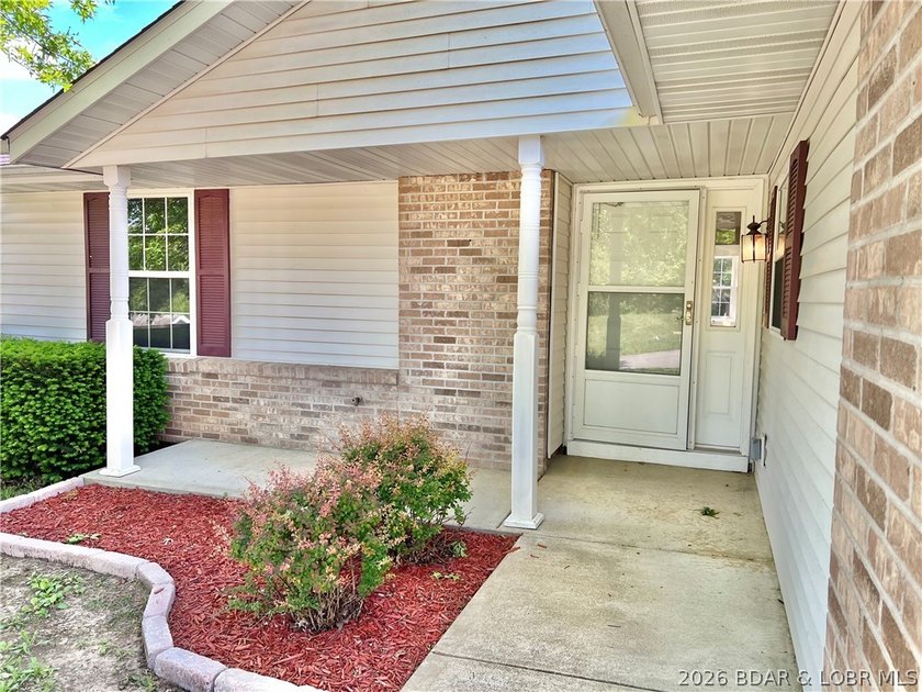 This lovely home is located in a sought-after 55+ community and - photo 3