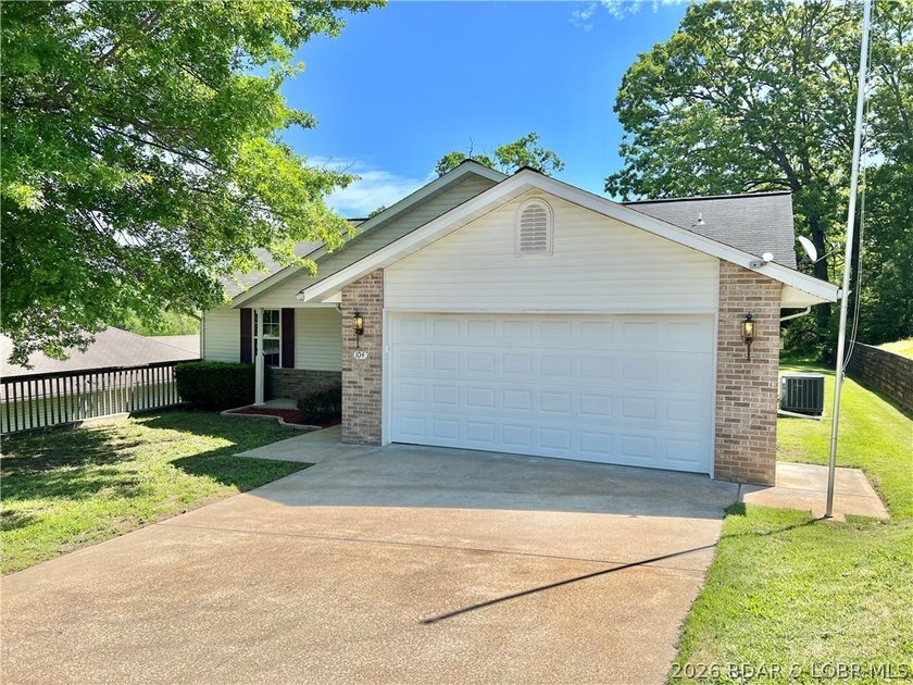 This lovely home is located in a sought-after 55+ community and - photo 4