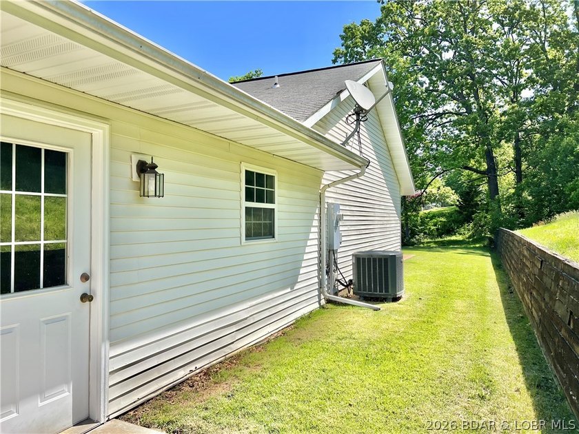 This lovely home is located in a sought-after 55+ community and - photo 5