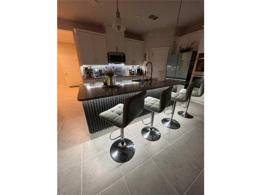 Built in 2023, this beautifully upgraded 5-bedroom, 3-bath home - photo 6