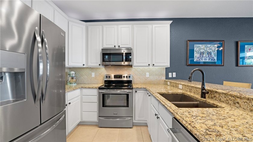 Situated in one of Osage Beach's most desirable gated - photo 10