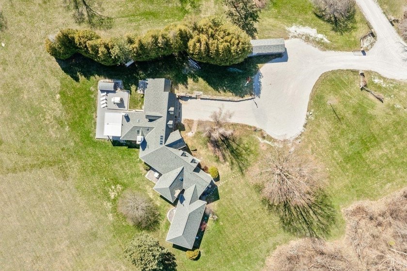 Lakefront Luxury Awaits! Nestled on over 20 sprawling acres with - photo 6