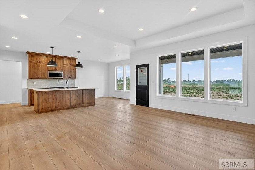 This stunning custom modern ranch style home features 4 bedrooms - photo 6