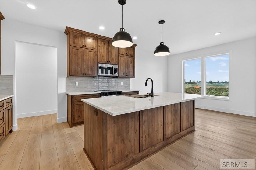 This stunning custom modern ranch style home features 4 bedrooms - photo 10