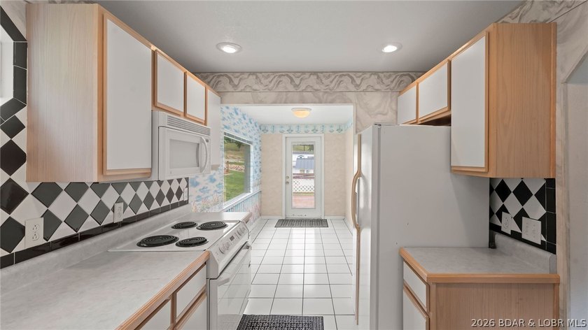 Move-in ready lakeview cabin offering 3 bedrooms, 2 baths, and - photo 2