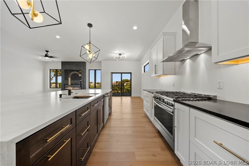 Introducing an exceptional new construction residence in the - photo 11