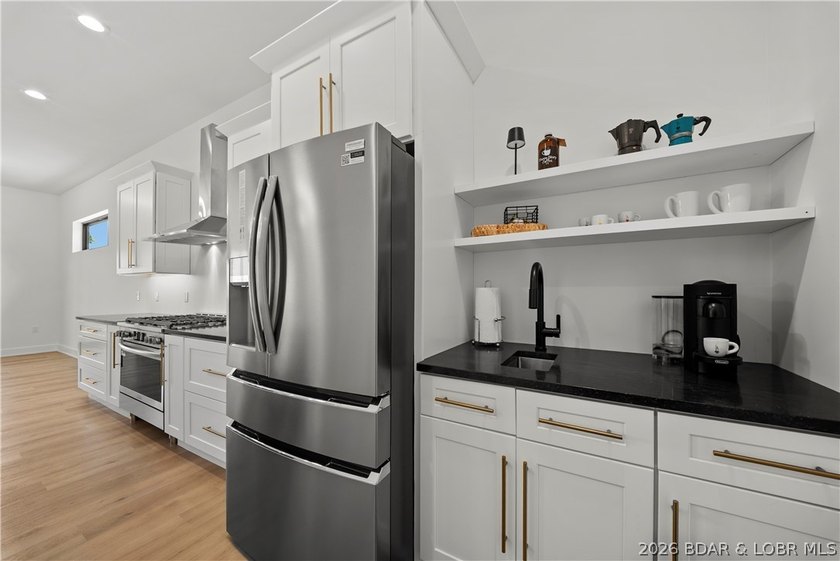 Introducing an exceptional new construction residence in the - photo 13