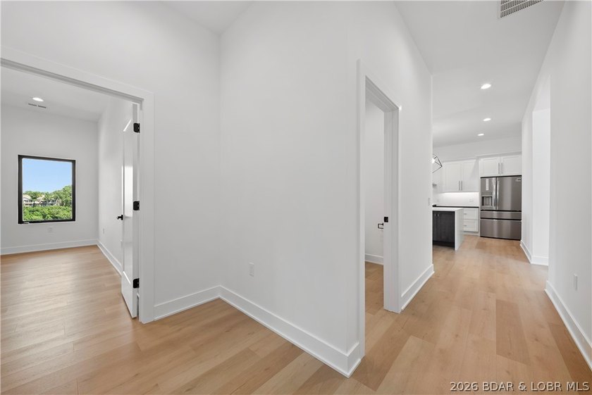Introducing an exceptional new construction residence in the - photo 23