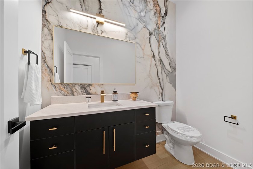 Introducing an exceptional new construction residence in the - photo 24
