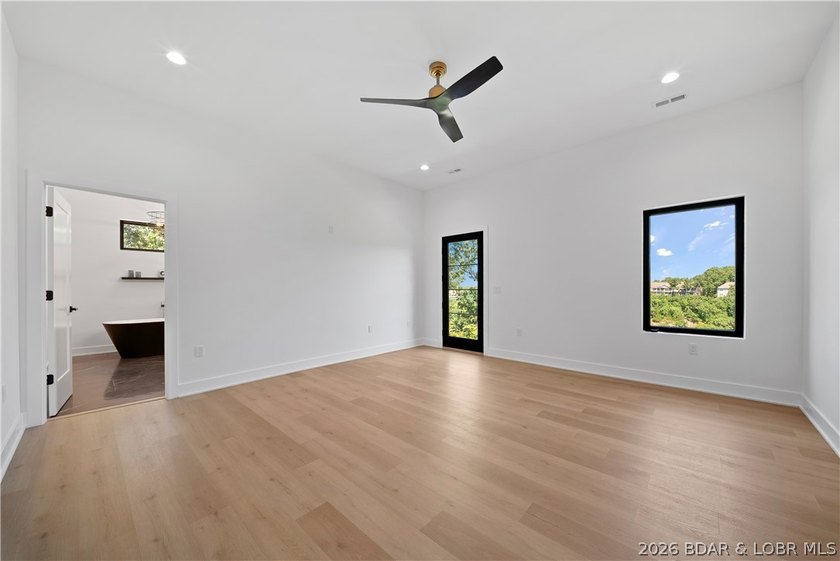 Introducing an exceptional new construction residence in the - photo 26