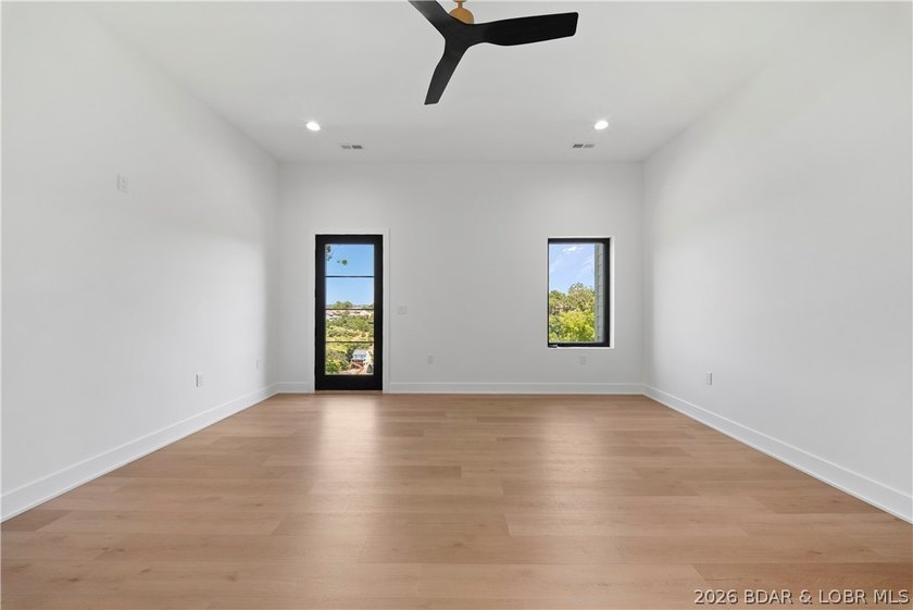 Introducing an exceptional new construction residence in the - photo 27