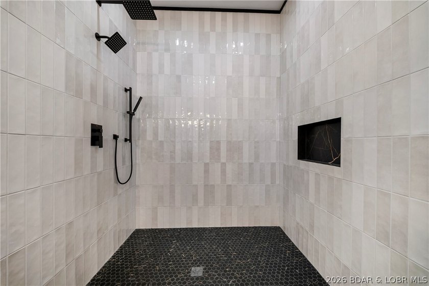 Introducing an exceptional new construction residence in the - photo 31