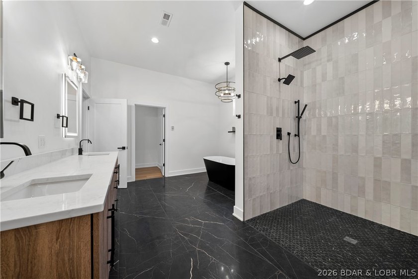 Introducing an exceptional new construction residence in the - photo 33