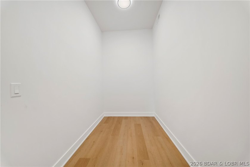 Introducing an exceptional new construction residence in the - photo 36
