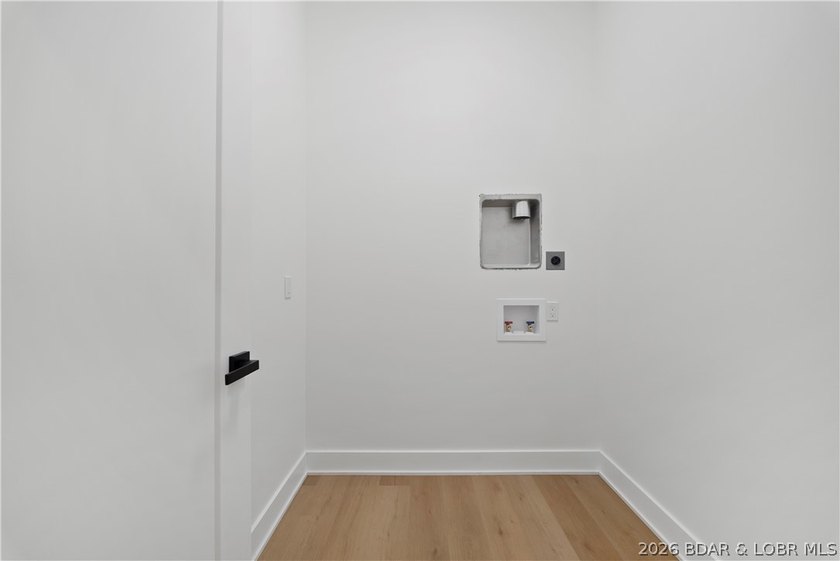 Introducing an exceptional new construction residence in the - photo 37
