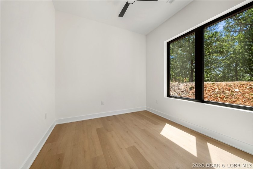 Introducing an exceptional new construction residence in the - photo 38