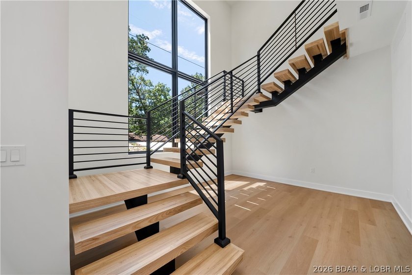 Introducing an exceptional new construction residence in the - photo 40