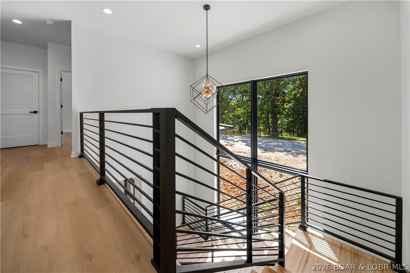 Introducing an exceptional new construction residence in the - photo 41