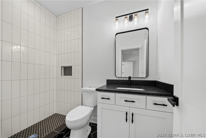 Introducing an exceptional new construction residence in the - photo 45