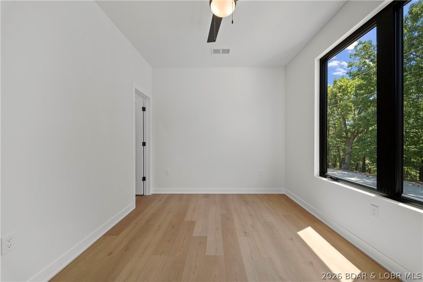 Introducing an exceptional new construction residence in the - photo 49