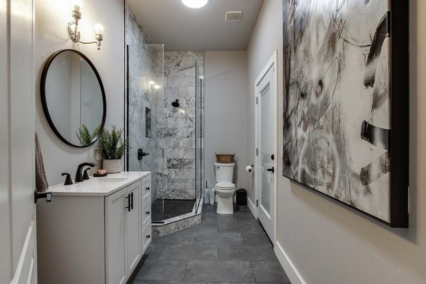 Set on nearly an acre (MOL) in Northwood Lake Estates, this - photo 16