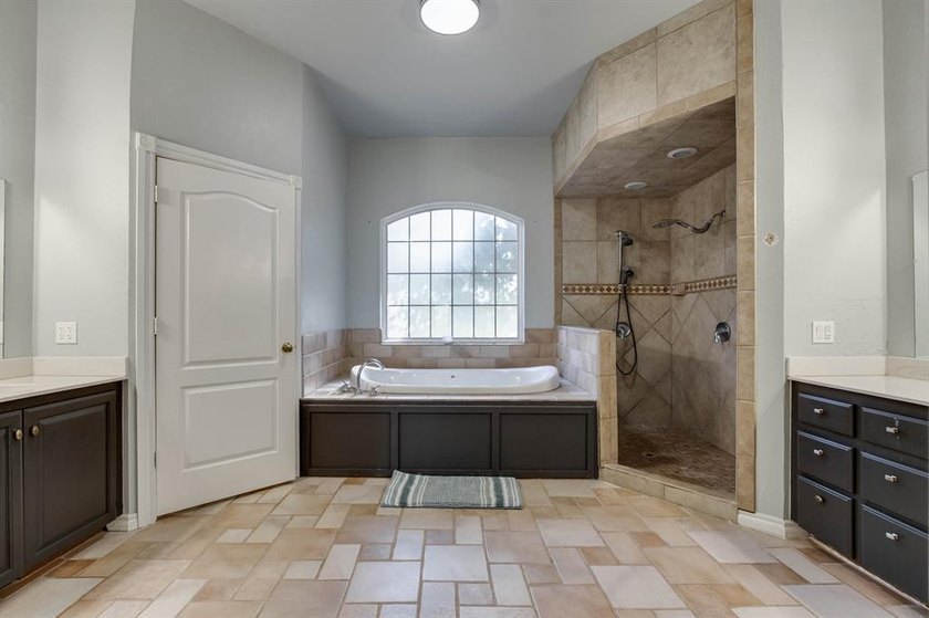 Set on nearly an acre (MOL) in Northwood Lake Estates, this - photo 17