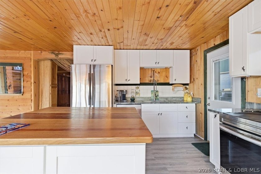 Charming lakefront cabin delivers the perfect blend of - photo 9